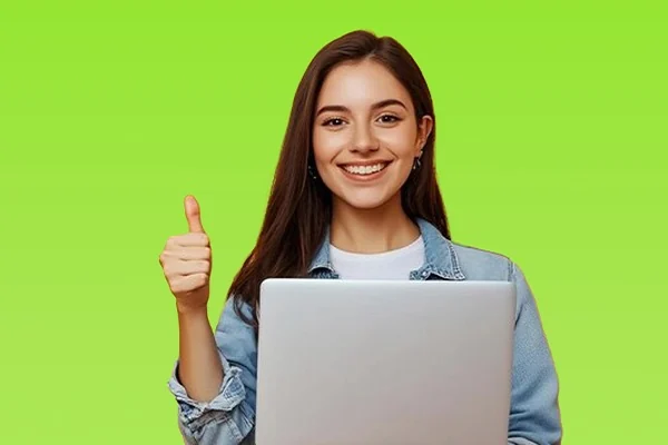 Happy student with a laptop giving a thumbs up after the Duolingo English Test